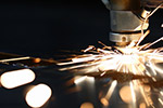 Sparks fly off the metal