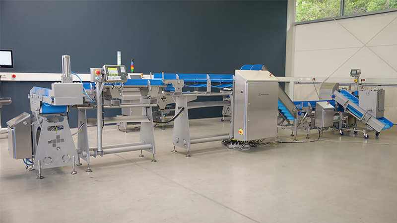Automatische Portionierungsanlage für Fleischwürfel